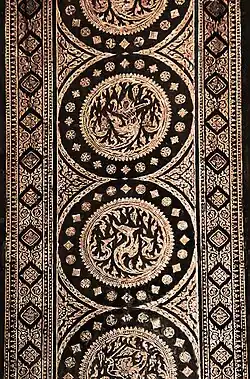 The mother-of-pearl inlaid doors of the Phra Phuttha Chinnarat vihara, Wat Phra Si Rattana Mahathat, Phitsanulok. Built in 1756 during the reign of King Borommakot, they are considered a masterpiece of late Ayutthaya art.[128]