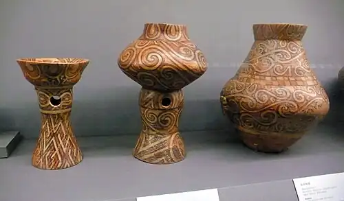 Cucuteni culture spirals on a bowl on stand, a vessel on stand, and an amphora, 4300-4000 BCE, ceramic, Palace of Culture, Iași, Romania