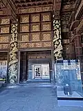 Gold-dragon decor replicas on the beams and eaves of Cixi's above-ground memorial hall; the originals were torn down and stolen during the 1928 looting.