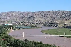 At Shapotou, Ningxia, with desert surrounding it