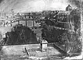 Daguerreotype of the Pont Neuf, 1836-39. Two people can be seen lying in the shade of the statue. Said to be the first successful daguerreotype taken in open air by Daguerre and Mathurin Fordos.