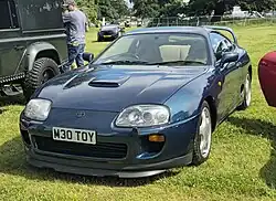European specification model with bonnet scoop, headlights washer and OEM active front lip[35] (pre-facelift)