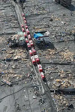 Emergency vehicles staging in the ruins of Otsuchi following the tsunami