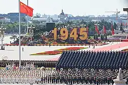 Flag of China flying in the 2015 Victory Day Parade.