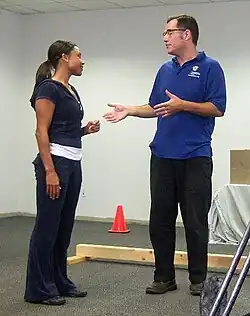 Dominique Dawes & IIG's James Underdown discussing test protocols, October 28, 2010