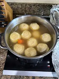 A pot of matzah ball soup for a Passover seder