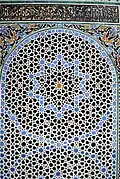 Geometric patterns in zellij tilework at the Al-Attarine Madrasa in Fes (14th century)