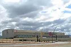 A movie studio with an "Albuquerque" sign in front of it.