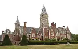 A photograph of a grand Victorian manor house