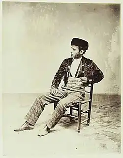 Andalusian, in "Majo" dress, wearing a sombrero calañes