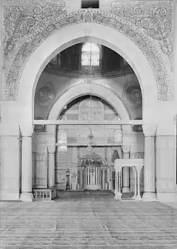 Interior view of the mosque showing the mihrab, indicating the qiblah