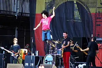 At the Drive-In in 2012. L–R: Rodríguez-López, Bixler-Zavala, Ward, Hajjar, and Hinojos.