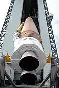 Core stage of an Atlas V being raised to a vertical position in preparation of launch of MRO