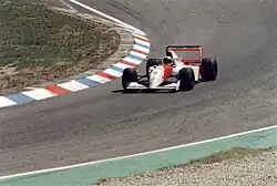 Senna driving a white McLaren MP4/8
