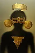 Muisca gold jewellery, including a headband, nose ornament and pectoral, on display at the Gold Museum in Bogota, Colombia.