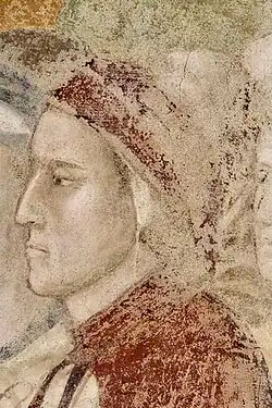 head-and-chest side portrait of Dante in red and white coat and cowl