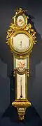 Louis XVI style barometer-thermometer; c. 1776; soft-paste Sèvres porcelain, enamel, and ormolu; height: 1 m, width: 0.27 m[130]