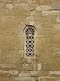 Visigothic window with stone tracery, Church of San Juan Bautista, Baños de Cerrato, 7th century