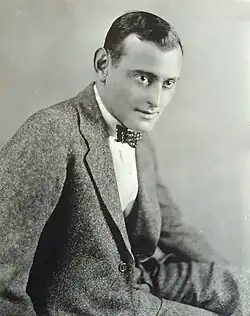 A portrait of Benjamin Glazer in a spotted bowtie.