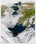 Satellite photo of the Bering Sea – Alaska is on the top right, Siberia on the top left