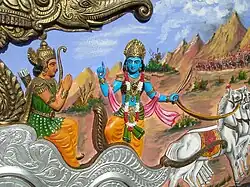 House decoration of Krishna speaking to Arjuna