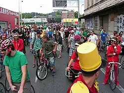 Many bicyclists with colorful clothes
