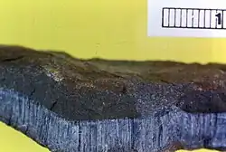 Blue asbestos (crocidolite); the ruler is 1&nbsp;cm