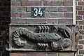 Scorpio adorning a building in Hamburg, Germany, designed by sculptor Richard Kuöhl