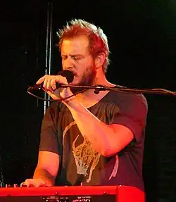 A close-up photograph of Justin Vernon