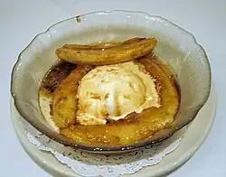 Bananas Foster, made of bananas and vanilla ice cream with a sauce made of butter, brown sugar, cinnamon, dark rum and banana liqueur