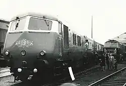 A black and white photo of a Pullman locomotive, which are distinctive due to the shape of the front, which although it is streamlined is made up of quite flat plates