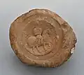 A bulla (seal) of Wahrām, an Ērān-spāhbed. It mentions either Husraw I (r.&nbsp;531–579) or II (591–626)[23]