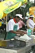 Another picture of roti canai preparation