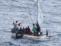 Cuban refugees aboard the Carnival Liberty cruise ship after being rescued at sea, August 2014
