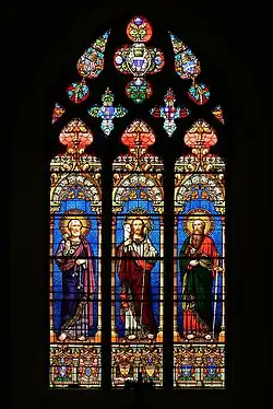 A brightly coloured window at Cassagnes-Bégonhès, Aveyron