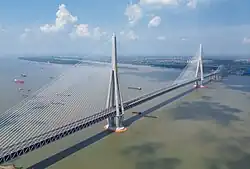 The Changtai Yangtze River Bridge in Jiangsu province, China has a main span of 1,176 metres (3,858&nbsp;ft), the world's longest cable-stayed bridge span as of 2026.