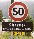 Road sign for Charvex (La Balme de Thuy), Haute-Savoie, France, after a name change in the 1990s to a historical Savoyard spelling (Former village name: Charvet)