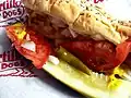Chicago-style hot dog with sport peppers