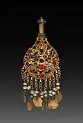 Earring with Vishnu riding Garuda; c. 1600; gold set with jewels and semi-precious stones; overall: 2.6 centimetres (1.0&nbsp;in); from Nepal; Cleveland Museum of Art (Cleveland)