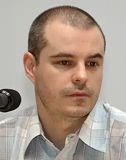Middle aged man looking towards the camera