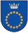 A coat of arms depicting a circle for which the boundary is itself made up of beige circles all under a silver crown on a blue background