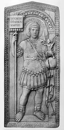 406 representation of Honorius attended by a winged Victory on a globe and bearing a labarum with the words In nomine XRI vincas semper, lit. 'In the name of Christ thou wilt always conquer'