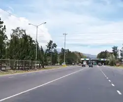 Pan-American Highway in Tres Rios, Costa Rica, right before the toll plaza (about 350&nbsp;km or 220&nbsp;mi to go until the Panamanian border).