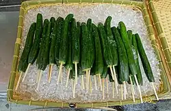 Japanese asazuke pickled cucumbers sold as street food on Enoshima island