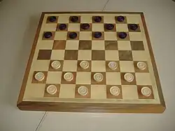 8×8 board, starting position in Italian and Portuguese draughts