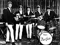 Get Yourself a College Girl appearance, 1964 – From left: Mike Smith, Lenny Davidson, Denis Payton, Rick Huxley, and Dave Clark.