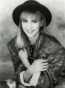 Debbie Gibson smiling toward the camera.