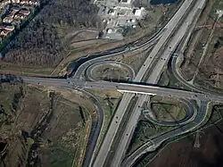 A parclo A4 interchange along Highway&nbsp;407 on the Mississauga / Milton, Ontario, boundary 43°34′17.8″N 79°47′23.6″W﻿ / ﻿43.571611°N 79.789889°W﻿ / 43.571611; -79.789889