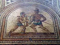 mosaic showing glasiators fighting