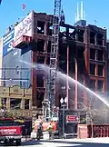 Dexter Building under demolition after fire